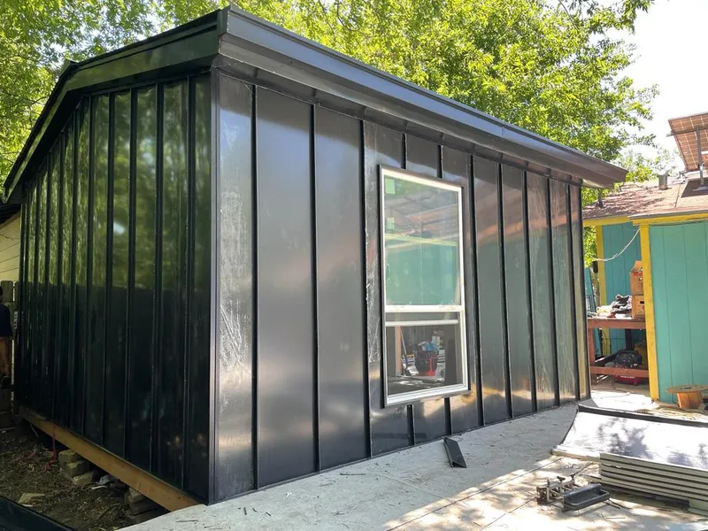 Black standing seam metal wall panels for Roof Inspection in Jupiter